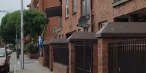 WATCH: Just another normal day in Dublin as a couch is manoeuvred off a balcony using brooms
