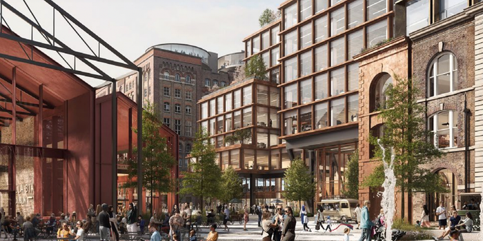 mock up image for the Guinness Quarter with large glass and red brick buildings, and an iron barn type structure