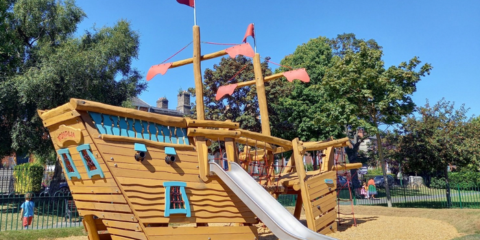 toy Wooden Ship with slide & climbing ropes in playground