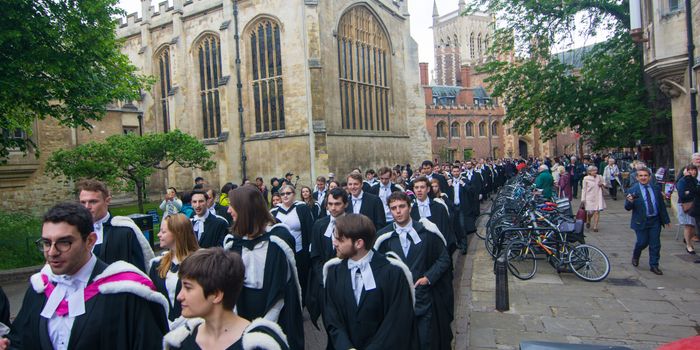 trinity students in graduation robes