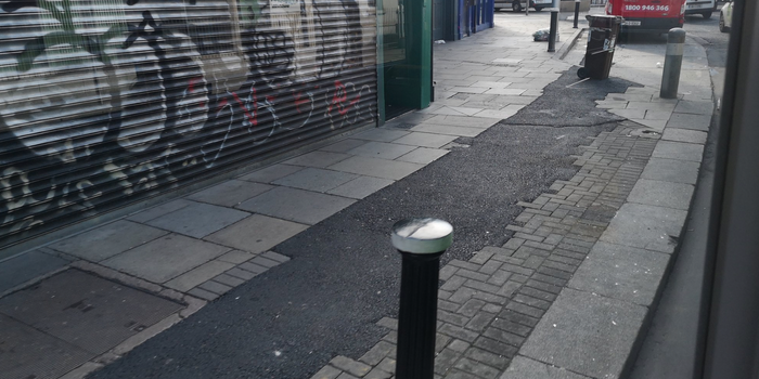 tar blob on a pavement in Dublin