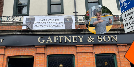 NYC cabby is welcomed with banner to settle 9-year pint debt