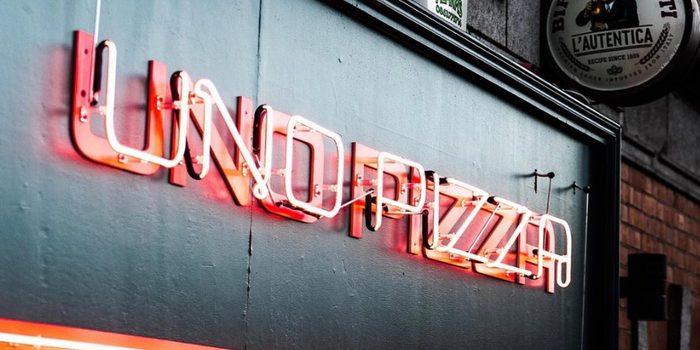 neon shop sign for uno pizza