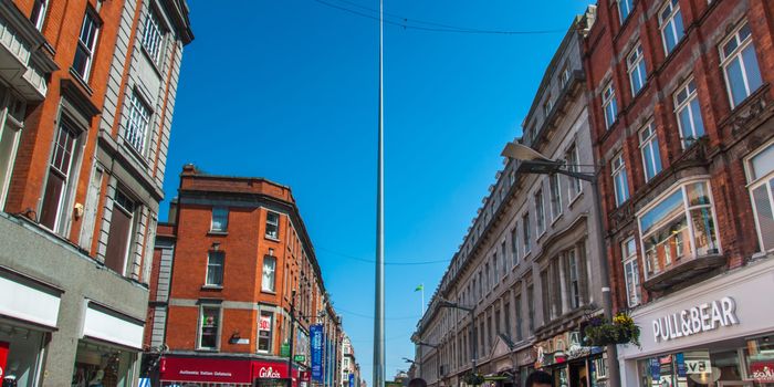 Mary Street in Dublin, full of people. The spire can be seen in the background