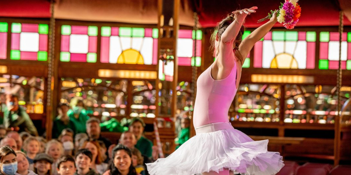 ballerina on stage at a paddys day performance in an irish pub